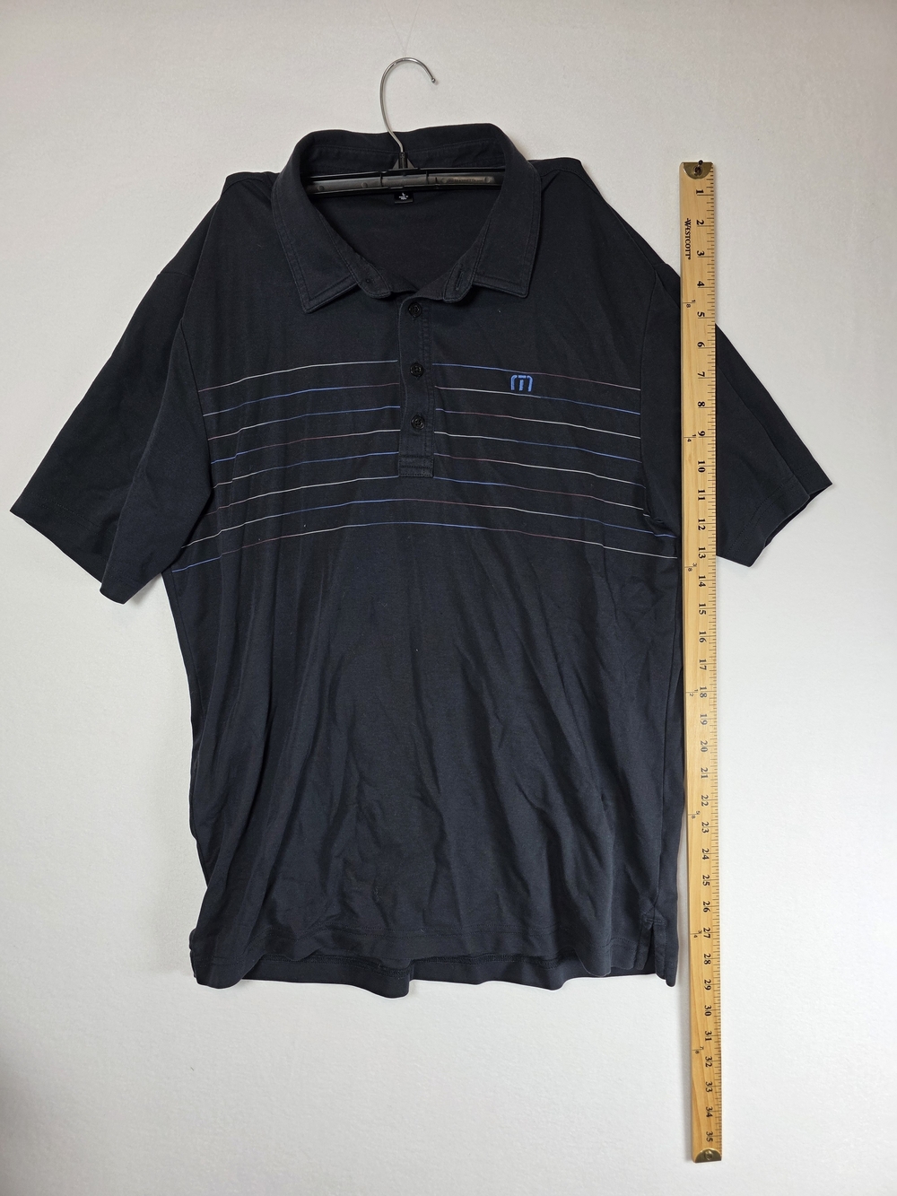 Travis Mathew Men's Black Golf Polo Shirt with Blue Stripe Detail - Large